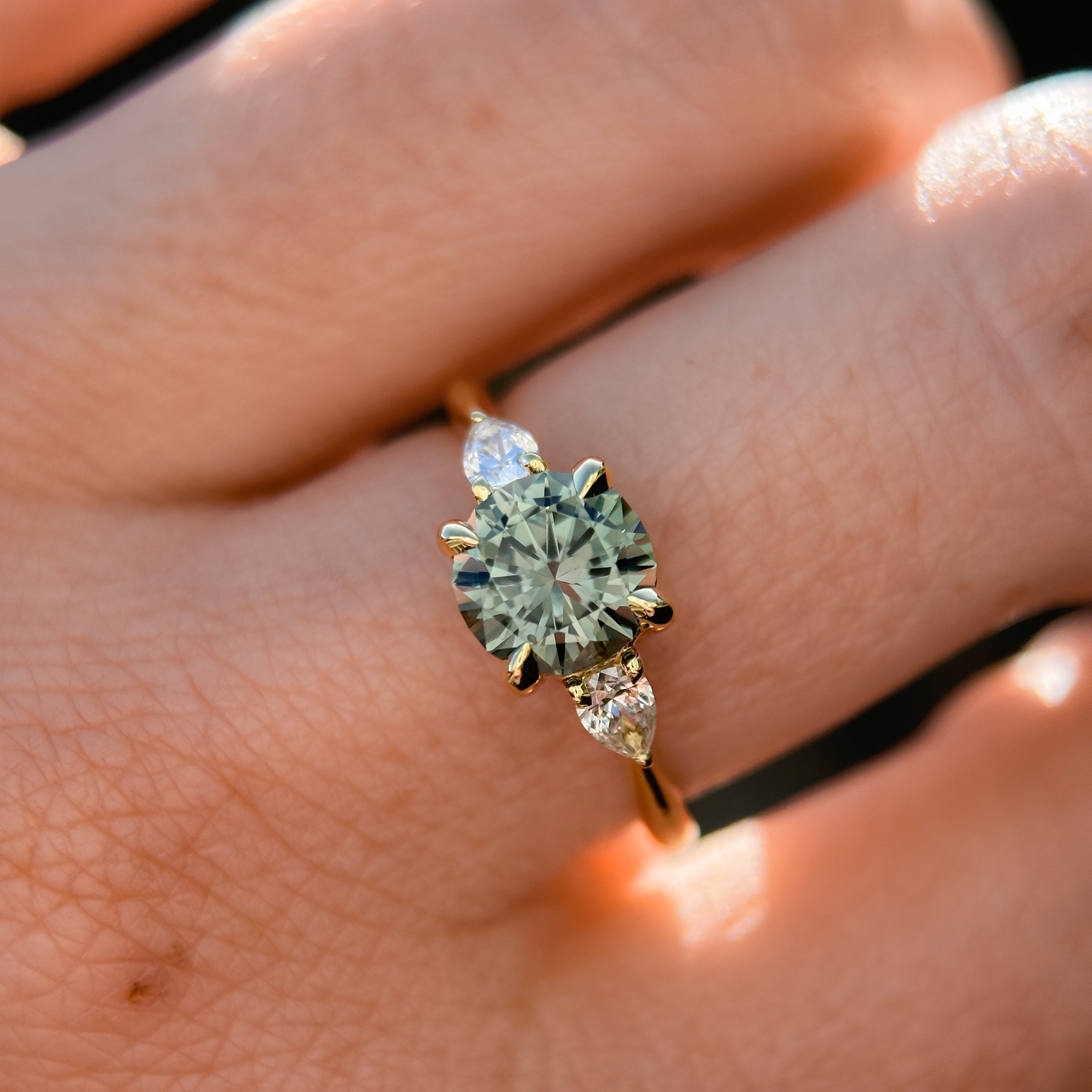 1.65ct Round Untreated Precision Cut Montana Sapphire and Natural Pear Diamond Three Stone Low Profile Ring in 18k Yellow Gold