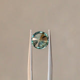 2.25CT ROUND PRECISION CUT MONTANA SAPPHIRE, MEDIUM GREENISH TEAL, 7.74X5.13MM