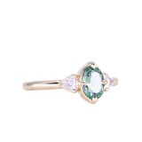 0.73ct Oval Unheated Montana Sapphire and Trillion Diamond Low Profile Ring in 14k Yellow Gold