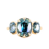 3.22ct Elongated Cushion Cut Montana Sapphire Three Stone Ring in 18k Yellow Gold