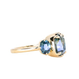 3.22ct Elongated Cushion Cut Montana Sapphire Three Stone Ring in 18k Yellow Gold