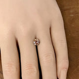 1.34CT PRECISION CUT ROUND BRILLIANT MONTANA SAPPHIRE, BICOLOR ORANGE-PINK, 6.5MM
