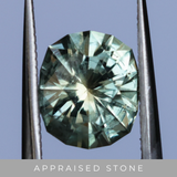 2.57CT FANCY PRECISION CUSHION MONTANA SAPPHIRE, PARTI OLIVE GREEN AND GOLD, 8.82X7.54X5.37MM - APPRAISED STONE