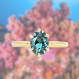 2.07ct Precision Cut Untreated Teal Oval Montana Sapphire Diamond-studded Sea Star Solitaire in 18k Yellow Gold