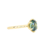 2.07ct Precision Cut Untreated Teal Oval Montana Sapphire Diamond-studded Sea Star Solitaire in 18k Yellow Gold