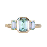 1.29ct Bezel Set Emerald Cut Untreated Montana Sapphire and Montana Sapphire Sides Three Stone Ring in 14k Yellow Gold