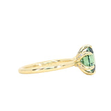 2.07ct Precision Cut Untreated Teal Oval Montana Sapphire Diamond-studded Sea Star Solitaire in 18k Yellow Gold