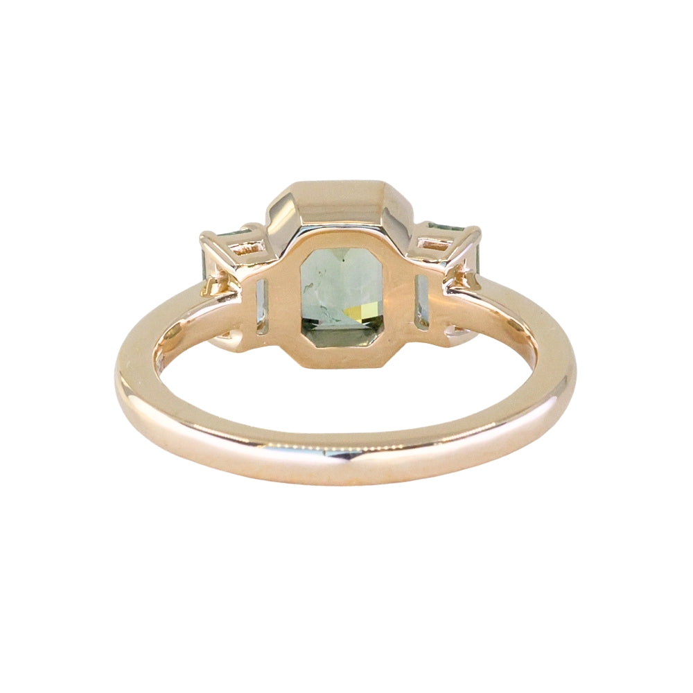 1.29ct Bezel Set Emerald Cut Untreated Montana Sapphire and Montana Sapphire Sides Three Stone Ring in 14k Yellow Gold