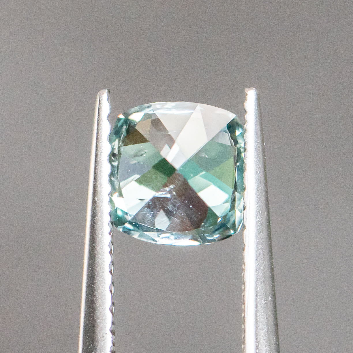 1.34CT CUSHION CUT MONTANA SAPPHIRE, SKY BLUE TEAL, 6.05X6.02X4.54MM, UNHEATED