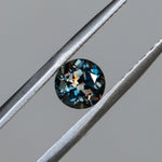 1.22CT ROUND MONTANA SAPPHIRE, MULTICOLOR BROWN PURPLE ORANGE BLUE, 6.20MM