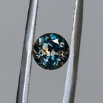 1.22CT ROUND MONTANA SAPPHIRE, MULTICOLOR BROWN PURPLE ORANGE BLUE, 6.20MM