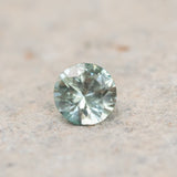 0.77CT ROUND BRILLIANT MONTANA SAPPHIRE, WHITE AND SOFT SEAFOAM GREEN, 5.5X1.00MM