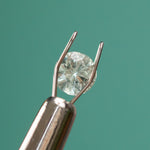 0.77CT ROUND BRILLIANT MONTANA SAPPHIRE, WHITE AND SOFT SEAFOAM GREEN, 5.5X1.00MM