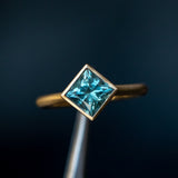 2.17ct Princess Cut Teal Montana Sapphire Contemporary Bezel Set Ring in 18k Yellow Gold