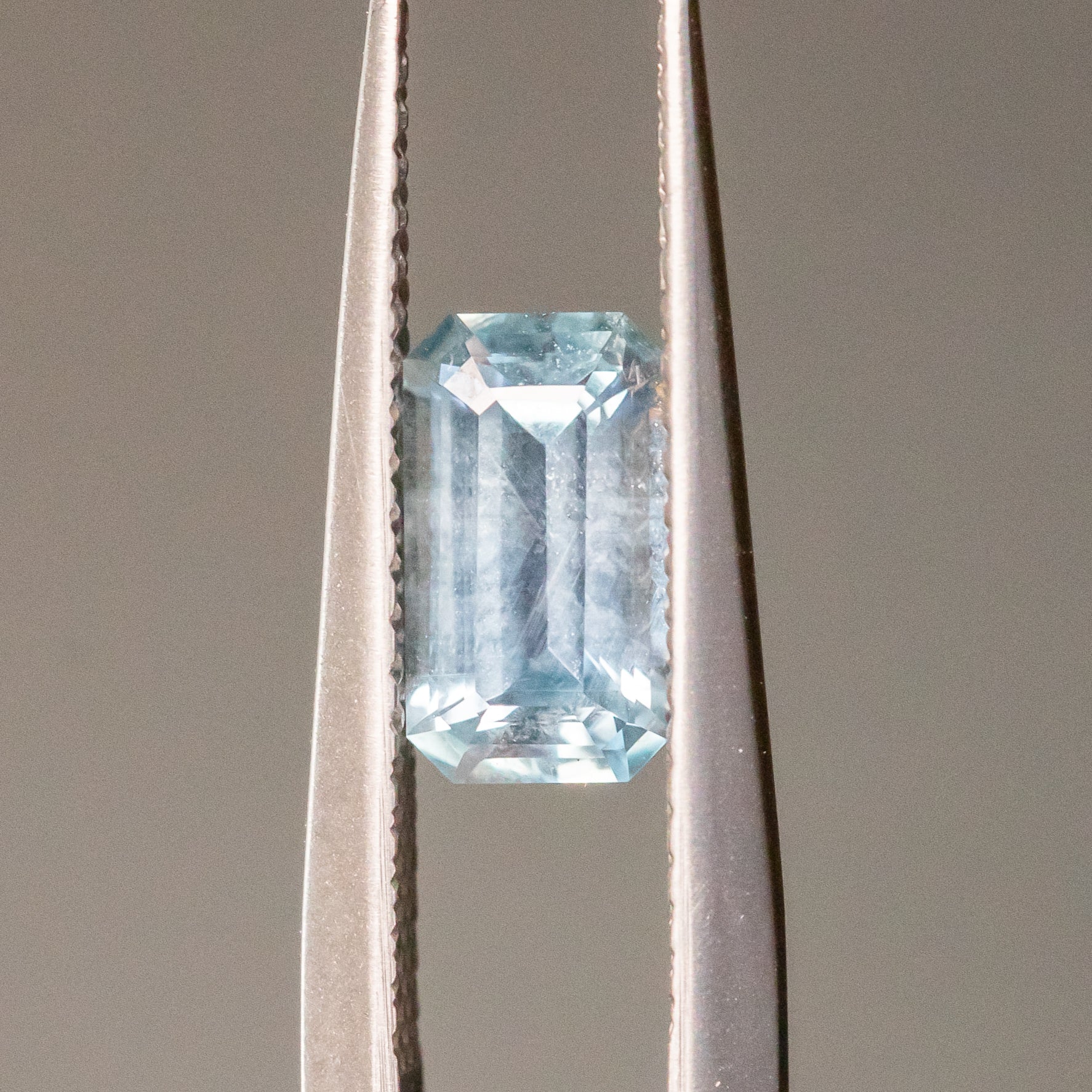 1.22CT EMERALD CUT MONTANA SAPPHIRE, ICEY BLUE GREY, 8X4.5X4MM