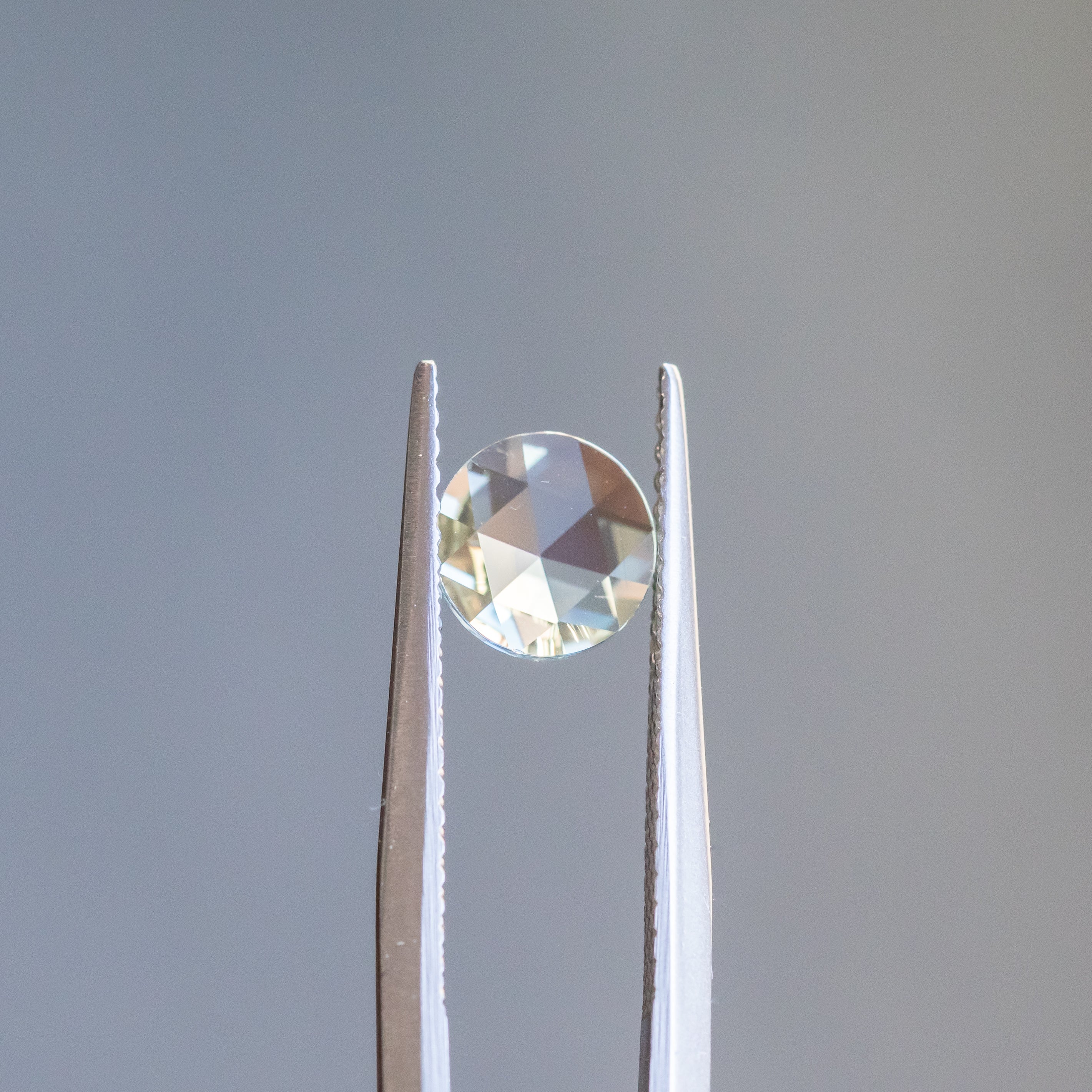 0.81CT ROUND ROSECUT MONTANA SAPPHIRE, ICEY LIGHT BLUE, 6.52X2.28MM