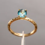 1.63ct Oval Montana Sapphire Evergreen Carved Solitaire in 18k Yellow Gold