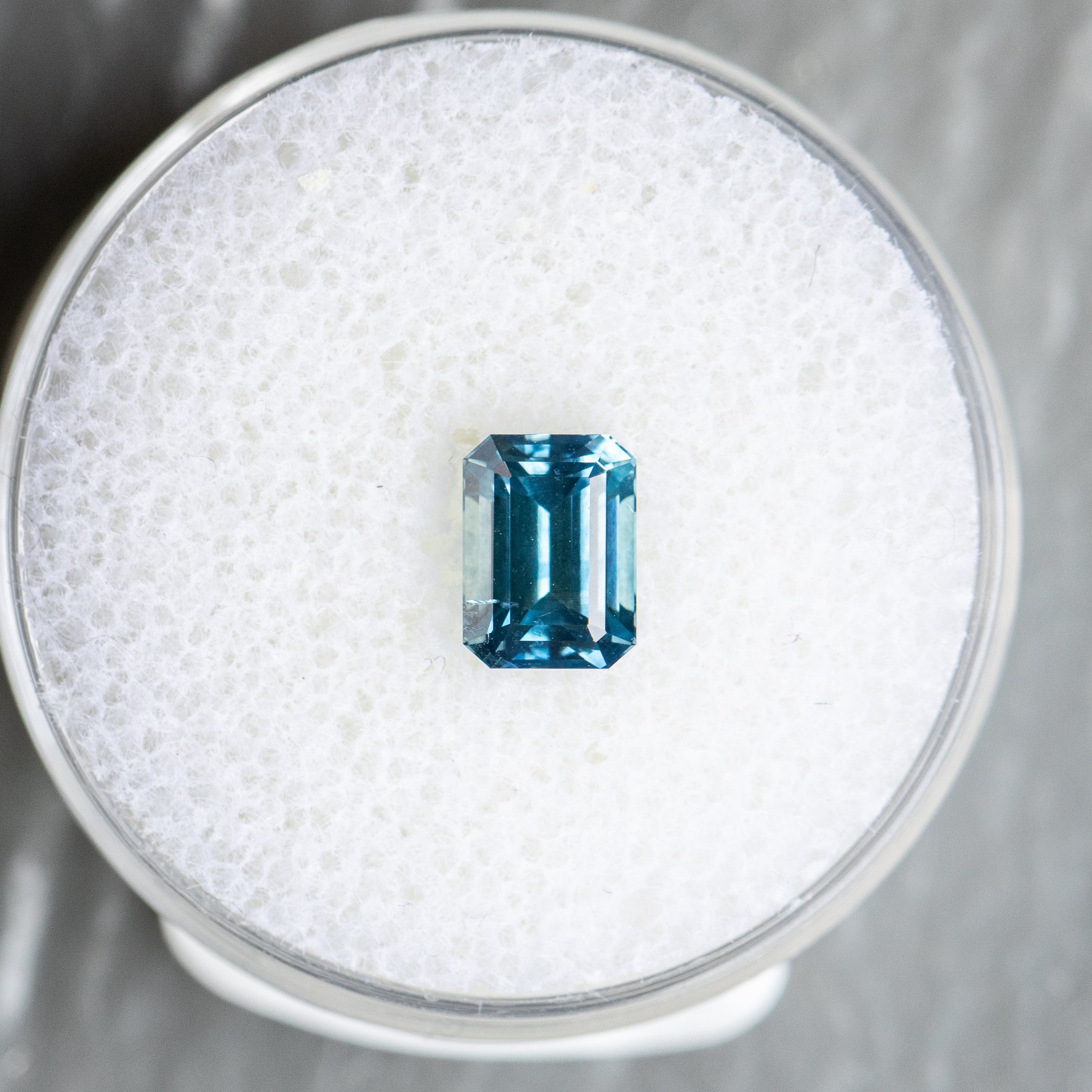 1.36CT EMERALD CUT MONTANA SAPPHIRE, BLUE, 6.6X4.9MM