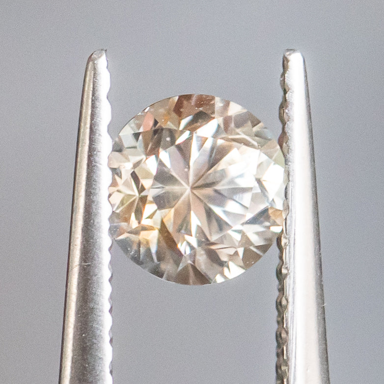 0.74CT ROUND MONTANA SAPPHIRE, PARTI PEACH PINK, 5.07X3.90MM, UNTREATED