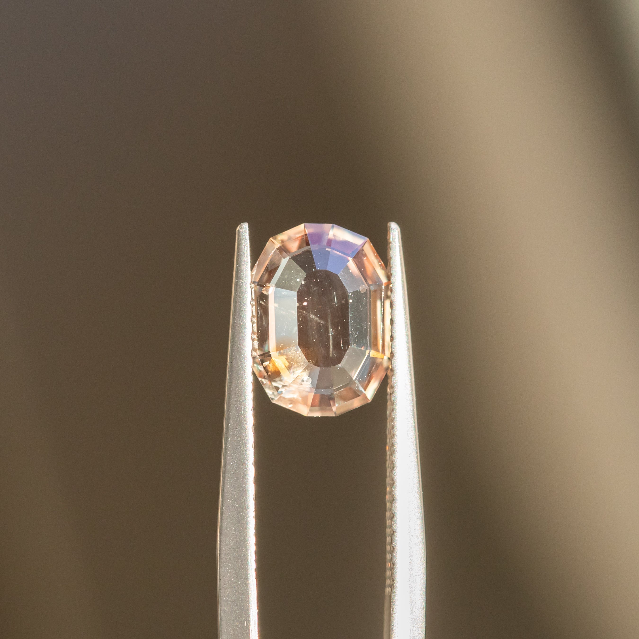 2.17CT PORTRAIT SAPPHIRE, SOFT PEACH WITH ORANGE GLOW INCLUSION, 9.75X7.45X2.73MM