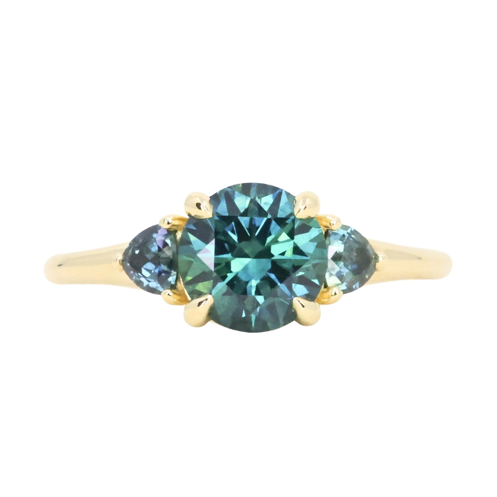 1.82ct Round Teal Precision Cut Montana Sapphire and Trillion Sapphire Low Profile Three Stone Ring in 18k Yellow Gold
