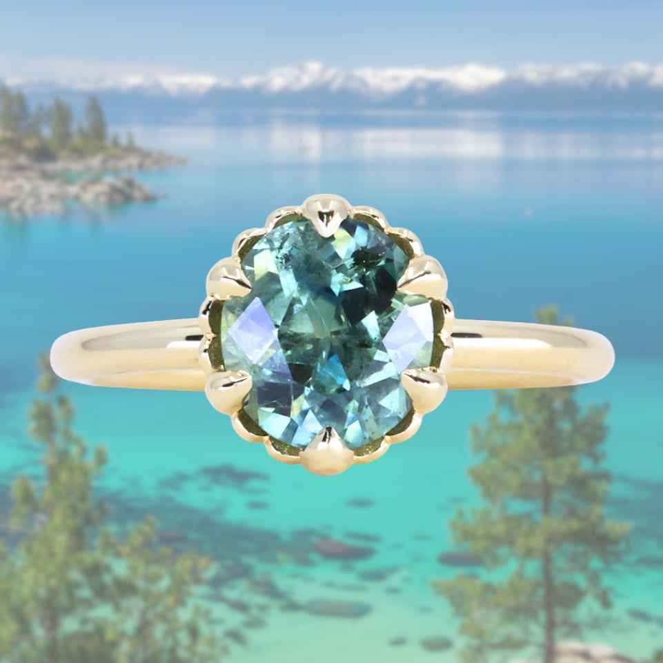 1.93ct Oval Silky Teal Montana Sapphire Scallop Cup Solitaire in 18k Yellow Gold