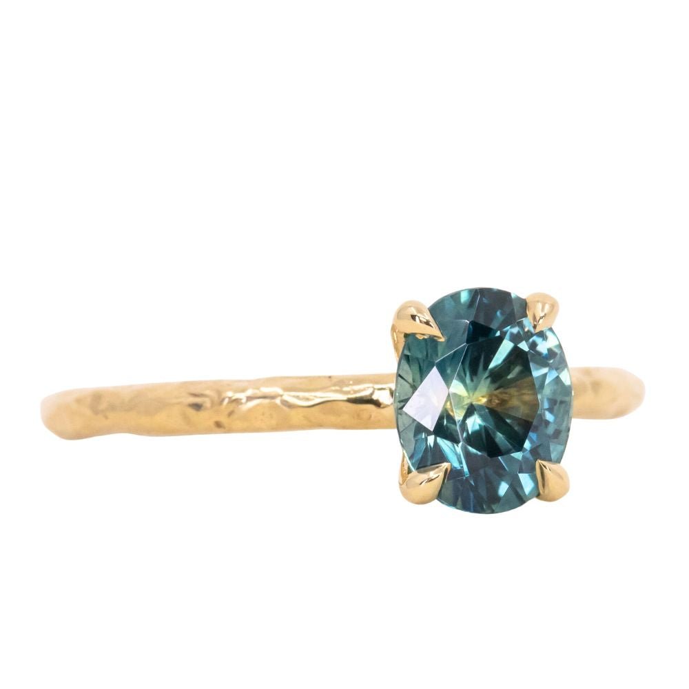 1.63ct Oval Montana Sapphire Evergreen Carved Solitaire in 18k Yellow Gold