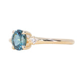 0.85ct Oval Deep Teal Montana Sapphire and Princess Cut Diamond Rapids Low Profile Ring in 14k Yellow Gold