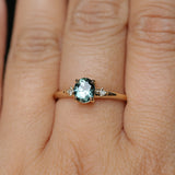 0.90ct Oval Light Blue Green Montana Sapphire and Princess Cut Diamond Rapids Low Profile Ring in 14k Yellow Gold