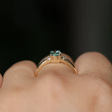 0.90ct Oval Light Blue Green Montana Sapphire and Princess Cut Diamond Rapids Low Profile Ring in 14k Yellow Gold