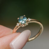 0.90ct Oval Light Blue Green Montana Sapphire and Princess Cut Diamond Rapids Low Profile Ring in 14k Yellow Gold