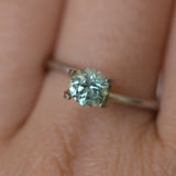 0.85CT ROUND PRECISION CUT MONTANA SAPPHIRE, LIGHT GREEN YELLOW, 5.55X3.70MM