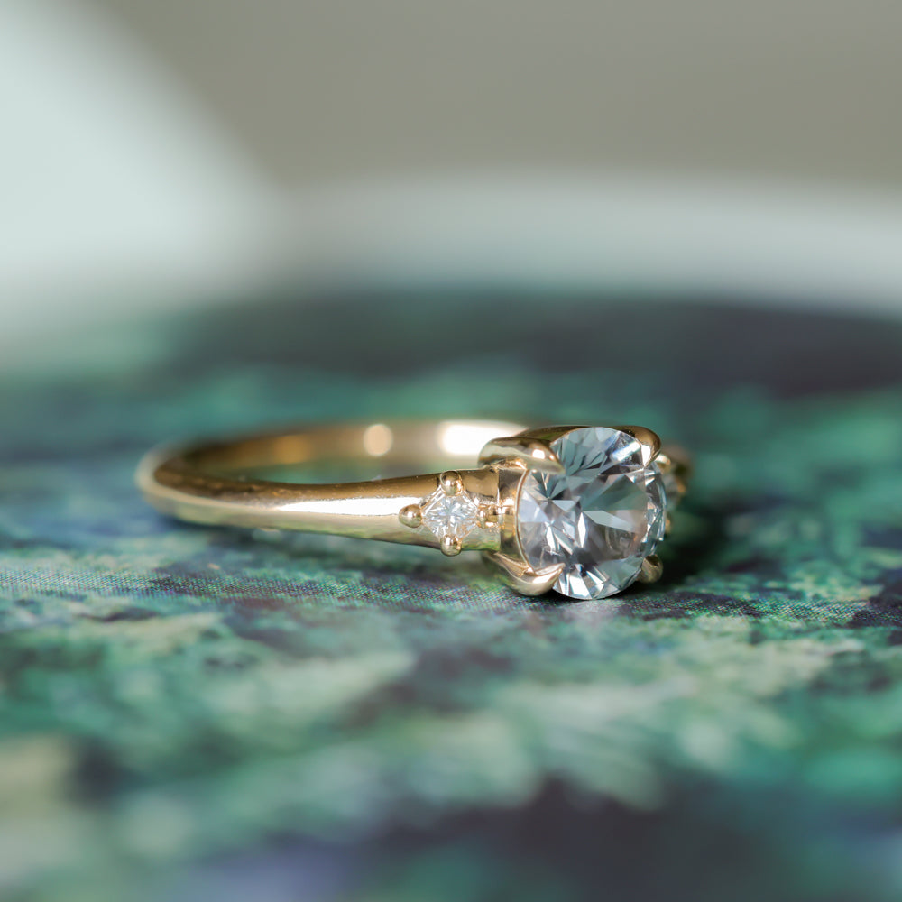 0.98ct Round Color Shifting Untreated Montana Sapphire and Princess Cut Diamond Rapids Low Profile Ring in 14k Yellow Gold