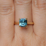 2.67ct Untreated Radiant Cut Montana Sapphire Four Prong Cathedral Solitaire in 18k Yellow Gold