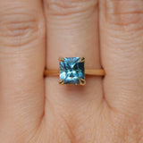 2.67ct Untreated Radiant Cut Montana Sapphire Four Prong Cathedral Solitaire in 18k Yellow Gold