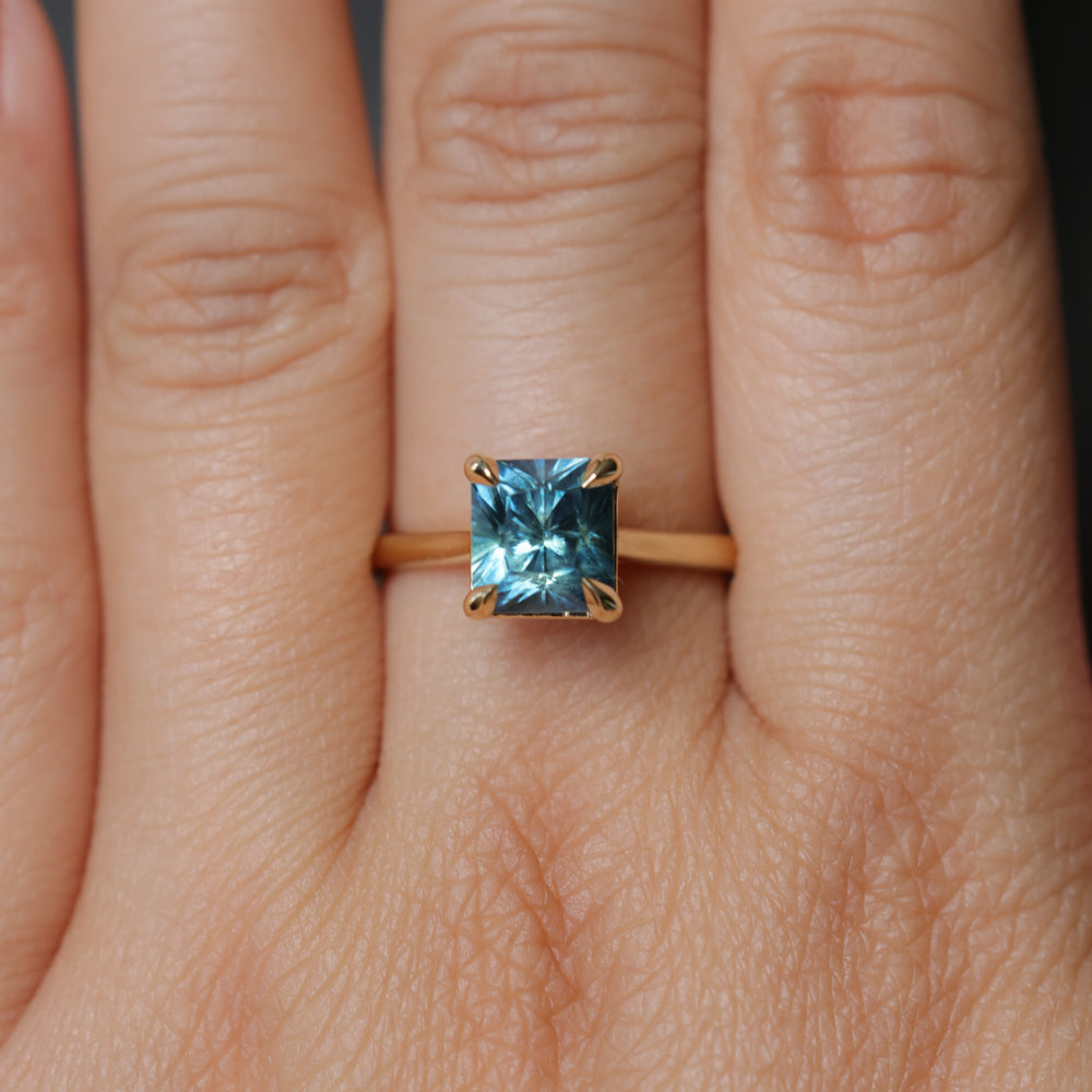 2.67ct Untreated Radiant Cut Montana Sapphire Four Prong Cathedral Solitaire in 18k Yellow Gold