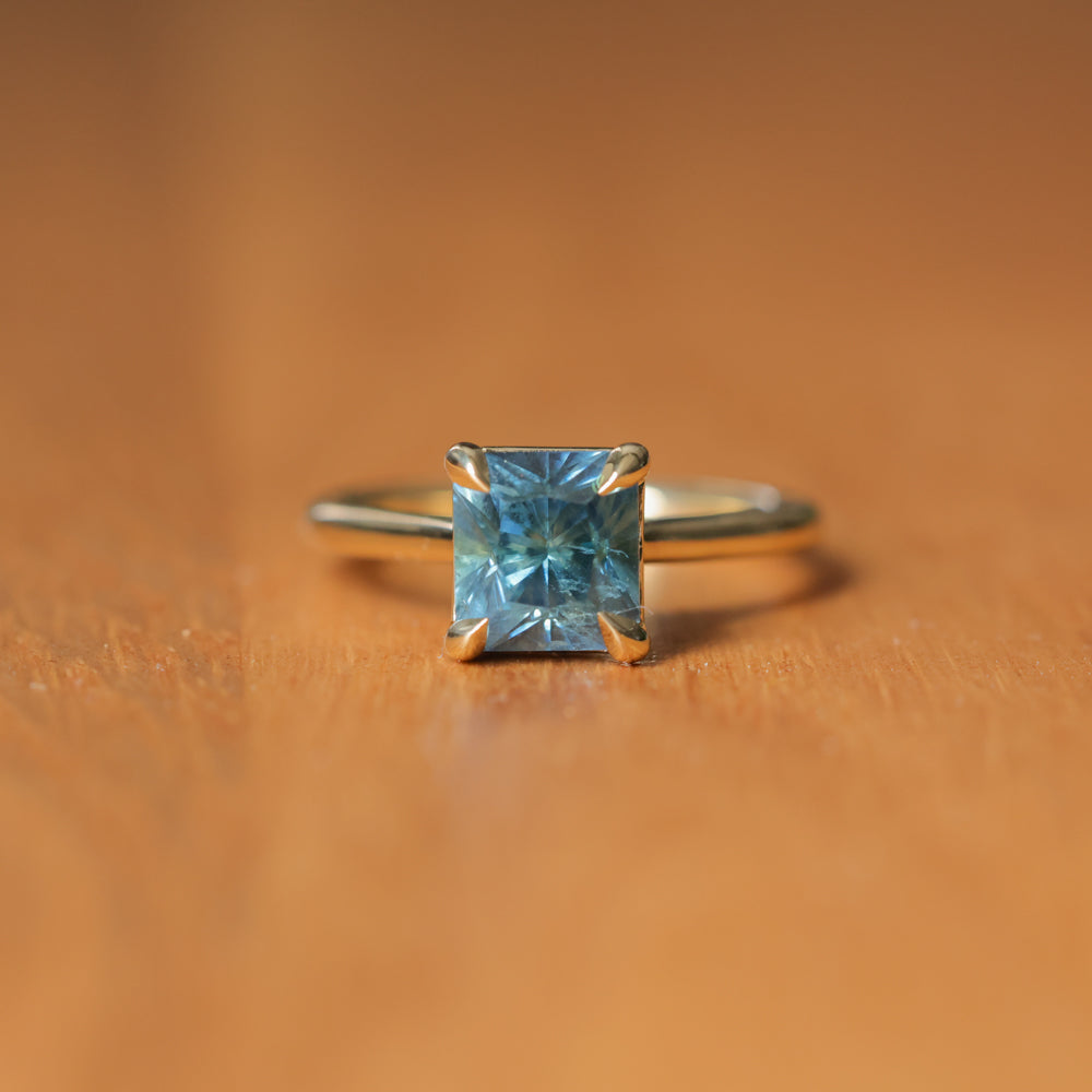 2.67ct Untreated Radiant Cut Montana Sapphire Four Prong Cathedral Solitaire in 18k Yellow Gold