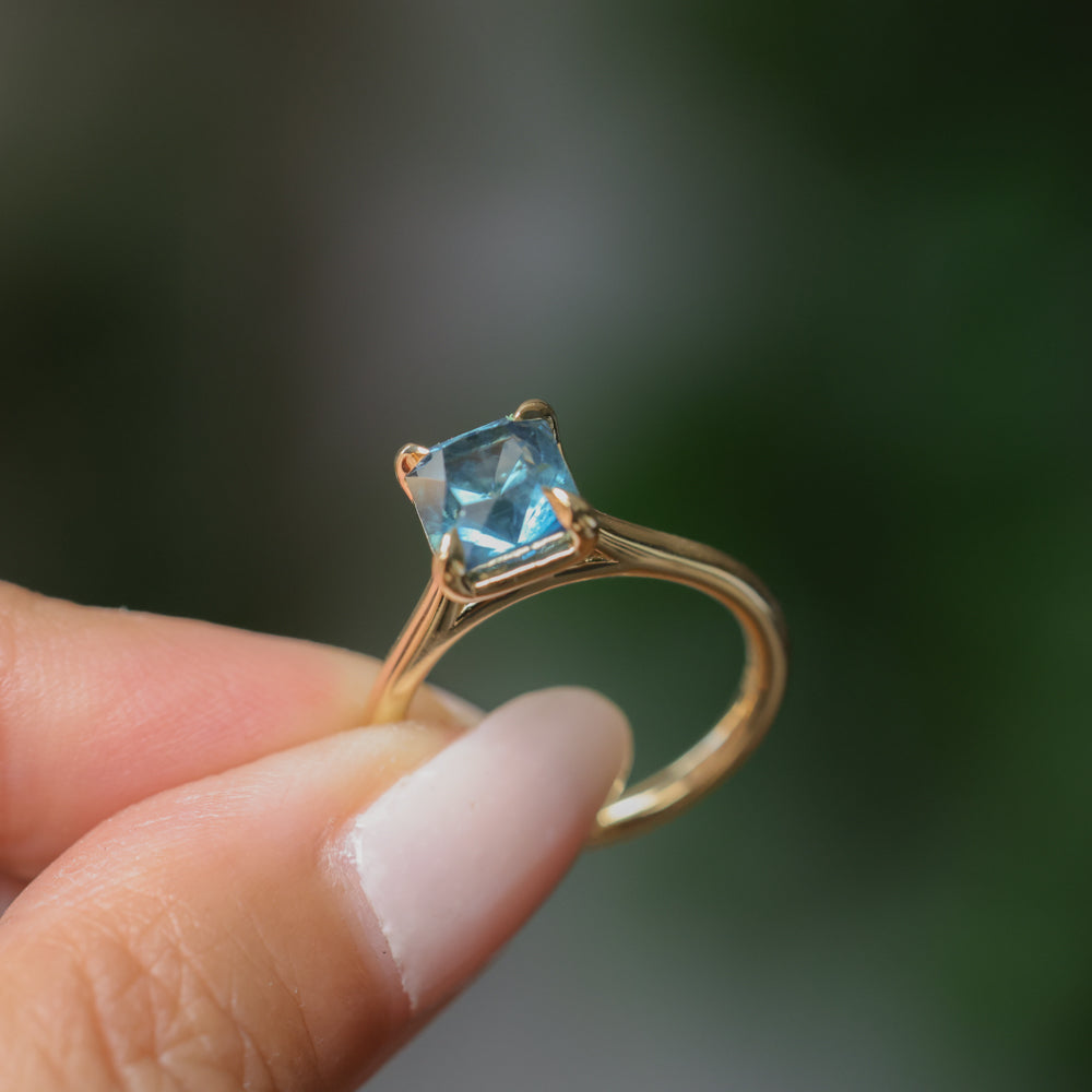 2.67ct Untreated Radiant Cut Montana Sapphire Four Prong Cathedral Solitaire in 18k Yellow Gold