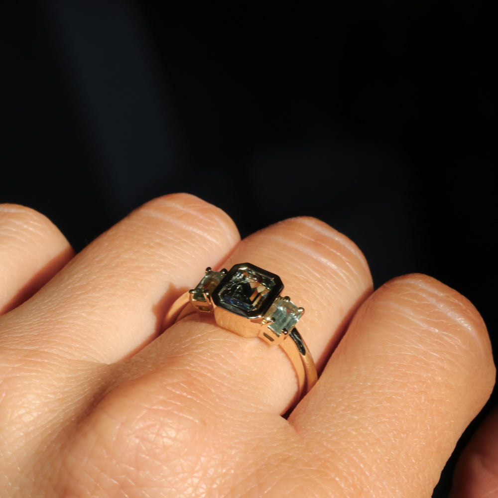 1.29ct Bezel Set Emerald Cut Untreated Montana Sapphire and Montana Sapphire Sides Three Stone Ring in 14k Yellow Gold