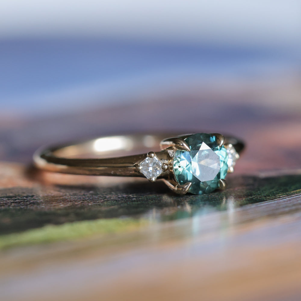 0.80ct Round Montana Sapphire and Princess Cut Diamond Rapids Low Profile Ring in 14k Yellow Gold