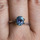 1.73CT PRECISION CUT OVAL MONTANA SAPPHIRE, DENIM PARTI TEAL WITH EARTHY INCLUSIONS, 7.47X6.16X4.69MM