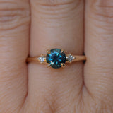 1.10ct Round Deep Teal Montana Sapphire and Princess Cut Diamond Rapids Low Profile Ring in 14k Yellow Gold