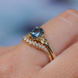 1.21ct Oval Blue Precision Cut Montana Sapphire Low Profile 4 Prong Leaf Bud Solitaire in 14k Yellow Gold