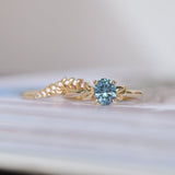 1.21ct Oval Blue Precision Cut Montana Sapphire Low Profile 4 Prong Leaf Bud Solitaire in 14k Yellow Gold