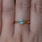 0.78ct Round Seafoam Teal Green Montana Sapphire Four Prong Lotus Solitaire in 14k Yellow Gold
