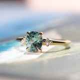 1.35ct Oval Brilliant Montana Sapphire and Princess Cut Diamond Rapids Low Profile Ring in 14k Yellow Gold