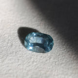 4.25CT ELONGATED CUSHION MONTANA SAPPHIRE, MEDIUM TEAL BLUE, UNTREATED, 11.87X8.18x5.12MM - APPRAISED STONE