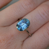 4.25CT ELONGATED CUSHION MONTANA SAPPHIRE, MEDIUM TEAL BLUE, UNTREATED, 11.87X8.18x5.12MM - APPRAISED STONE