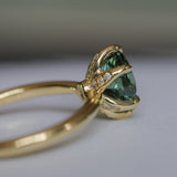 2.07ct Precision Cut Untreated Teal Oval Montana Sapphire Diamond-studded Sea Star Solitaire in 18k Yellow Gold