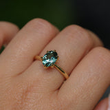 2.07ct Precision Cut Untreated Teal Oval Montana Sapphire Diamond-studded Sea Star Solitaire in 18k Yellow Gold